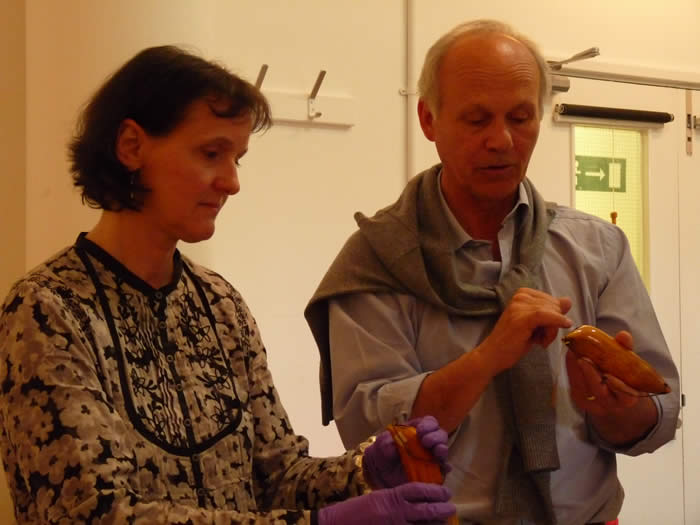 Dr. Anita Herle and Professor Steven Hooper examining tabua from MAA's Fijian collections